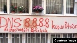 A photo posted on Twitter apparently shows a Google DNS server spray painted into a building in Turkey. (Via <a href="https://twitter.com/gulayozkan/status/446959549497356288/photo/1">Twitter</a>)