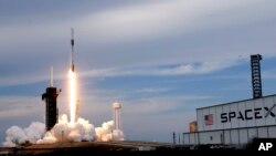 FILE — A SpaceX Falcon 9 rocket, with the Dragon capsule and four private astronauts, takes off from Pad 39A at the Kennedy Space Center in Cape Canaveral, Florida, May 21, 2023.