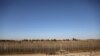 FILE - Israeli soldiers patrol the cease-fire line between Israel and Syria, as seen from the Israeli-occupied Golan Heights, July 26, 2018.