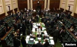 Members of parliament from the Australian state of Victoria participate in a marathon sitting to discuss a euthanasia bill in Melbourne, Australia, Oct. 20, 2017.