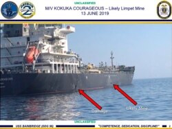 This June 13, 2019, image released by the U.S. military's Central Command, shows damage and a suspected mine on the Kokuka Courageous in the Gulf of Oman near the coast of Iran.