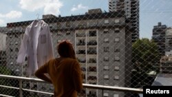 Venezuelan immigrant Jhannela Brito is seen in her apartment after softening immigration requirements for Venezuelans, in Buenos Aires, Argentina, Feb. 20, 2018.