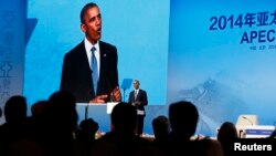 President Barack Obama speaks at the at the APEC CEO Summit in Beijing, November 10, 2014.