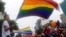 FILE - Participants attend the 5th annual LGBT pride parade in Hanoi, Vietnam, Aug. 21, 2016. East Timor, Asia's youngest nation, held its second LGBT pride parade July 21.