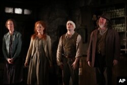 From left, Ingrid Craigie, Sarah Greene, Daniel Radcliffe and Pat Shortt appear at the opening night curtain call of "The Cripple of Inishmaan" on April 20, 2014, in New York.