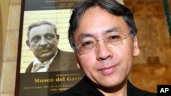 Author Kazuo Ishiguro poses for a photo before receiving the "Giuseppe Tomasi di Lampedusa" prize for literature, in Santa Margherita Belice, near Palermo, Sicily, southern Italy, Saturday Aug. 8, 2009. 