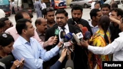Prosecutor Chaudhry Zulfikar talks to journalists outside the anti-terrorism court (ATC) in Rawalpindi, in this picture taken April 26, 2013.