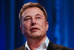 FILE - Tesla and SpaceX CEO Elon Musk speaks at the National League of Cities 2018 City Summit in Los Angeles, California, Nov. 8, 2018.