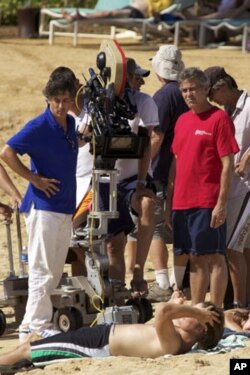 "The Descendants" director Alexander Payne (left) with star George Clooney during filming in Hawaii.