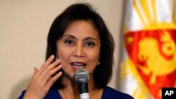 Philippine Vice President Leni Robredo, seen in this Dec. 5, 2016 file photo, is raising alarms about the president's bloody crackdown on illegal drug use, which she says can't be solved "with bullets alone," Wednewsday, March 15, 2017.
