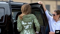 First lady Melania Trump arrives at Andrews Air Force Base, Md., June 21, 2018, after visiting the Upbring New Hope Children Center in McAllen, Texas. The first lady's team insisted that there was no hidden meaning behind the wording on the back of her jacket: "I really don't care. Do U?"