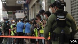 Polisi Hong Kong menangkap ratusan orang dalam aksi protes hari Minggu (6/9). 