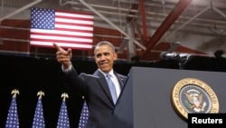 奥巴马总统走上讲台准备谈论移民法改革问题