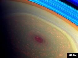 The Cassini spacecraft has captured the first detailed images of a giant hurricane on Saturn.