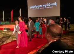 American actress Angelina Jolie, her Cambodian-born son Maddox and other children, arrive at an outdoor world premiere of "First They Killed My Father" near Angkor Wat in Siem Reap, Cambodia, February 18, 2017. (Amanda Boury/Netflix)