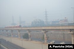 As pollution levels spike, Delhi and its satellite towns are enveloped in a haze of smog on Oct. 30, 2018.