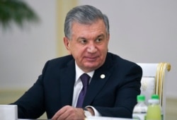 FILE - Uzbekistan's President Shavkat Mirziyoyev attends the meeting of the heads of CIS states in Ashgabat, Turkmenistan, Oct. 11, 2019.