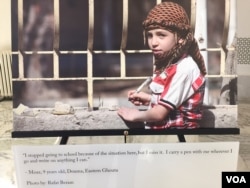 A photograph from the Humans of Syria project, on display at the U.S. Capitol building in Washington, D.C. (M. Bowman/VOA)