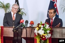 Perdana Menteri Timor Leste Taur Matan Ruak (kanan) dan Perdana Menteri Australia Scott Morrison (kanan) menghadiri konferensi pers bersama di Dili, 30 Agustus 2019. (Foto: AFP)