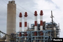 FILE - The power station Central San Juan of Puerto Rico Electric Power Authority (PREPA) is seen in San Juan, Puerto Rico, June 30, 2015.