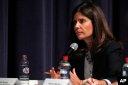 Jennifer Thomas, vice president of federal government affairs with the Alliance of Automobile Manufacturers, speaks during a Commerce Department hearing on investigation into whether auto imports threaten national security, July 19, 2018.