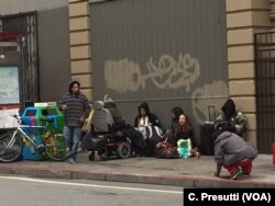 The Tenderloin section of San Francisco, California is in the process of gentrification but the street scenes defy it.