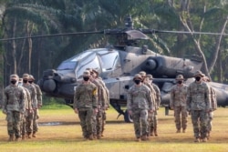 Tentara Angkatan Darat AS ambil bagian dalam pembukaan Latihan MIliter Gabungan Garuda Shield 2021 di Pusat Pelatihan Tempur Angkatan Darat Indonesia di Baturaja, provinsi Sumatera Selatan, 4 Agustus 2021. (Antara Foto/Nova Wahyudi/via Reuters)