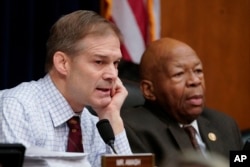 Rep. Jim Jordan of Ohio, the House Oversight and Reform Committee ranking Republican, left, and Chairman Elijah Cummings (Democrat-Maryland), right, are seen during a committee hearing on Capitol Hill in Washington, Feb. 26, 2019.