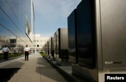 FILE - A bank of servers from Silicon Valley's Bloom Energy are shown at the headquarters of eBay in San Jose, Calif.