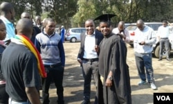 A graduate wearing his gown in Harare, July 26, 2016.