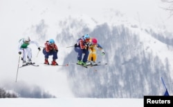 Don't call France's Ophelie David, Canada's Kelsey Serwa, Canada's Marielle Thompson and Sweden's Anna Holmlund (L-R) snow bunnies. They are simply awesome skiiers. Here, they compete at the 2014 Sochi Winter Olympic Games, Feb. 2014. (REUTERS)