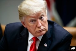 President Donald Trump speaks during a roundtable discussion in the Roosevelt Room of the White House, Dec. 18, 2018.