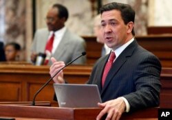 FILE - In this March 7, 2017, photo, state Sen. Chris McDaniel, R-Ellisville, speaks during floor debate in the Senate chambers at the Capitol in Jackson, Miss.