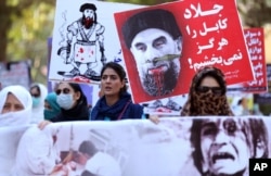 Demonstrators shout slogans against Gulbuddin Hekmatya, the leader of Hizb-i-Islami Gulbuddin party, during a demonstration in a public park in Kabul, Afghanistan, Sept. 22, 2016.