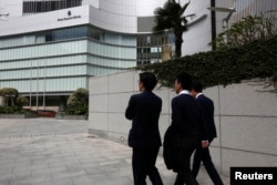 FILE - An entrance to Four Seasons Hotel in Hong Kong February 1, 2017, where Chinese billionaire Xiao Jianhua was last seen on January 27.