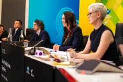FILE - New Zealand Prime Minister Jacinda Ardern, second right, chairs a virtual APEC leaders meeting from Wellington, New Zealand, July 16, 2021.