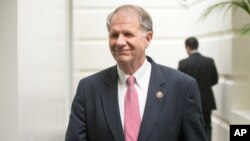 FILE - Rep. Ted Poe, R-Texas, walks to a GOP meeting on Capitol Hill in Washington, Dec. 16, 2015.
