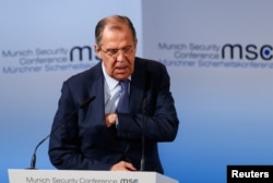 Russian Foreign Minister Sergei Lavrov walks before delivering his speech during the Munich Security Conference in Munich, Germany, Feb. 18, 2017.