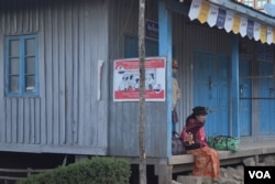 Voter education posters were translated in local languages ahead of Myanmar’s elections on November 8. (Photo: Daniel de Carteret for VOA)
