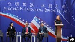 US Assistant Secretary of State for Education and Culture Affairs Marie Royce, right, delivers a speech during the dedication ceremony of the American Institute in Taiwan (AIT) new office complex, the de facto embassy, in Taipei, Taiwan, June 12, 2018.