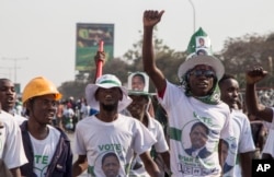 FILE - Supporters of the ruling party celebrate the results of the presidential elections in Lusaka, Zambia, Aug. 15, 2016.