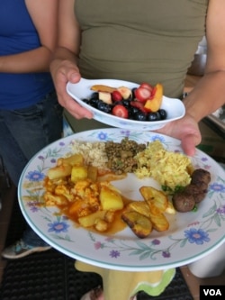 Fresh produce turns into a feast at Eco City Farms. (Rosanne Skirble/VOA)