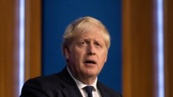 FILE - Britain's Prime Minister Boris Johnson holds a news conference on a winter COVID-19 plan in the Downing Street Briefing Room in London, Sept. 14, 2021.