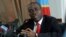 FILE - Democratic Republic of Congo's Prime Minister Augustin Matata Ponyo is seen speaking during a press conference in Kinshasa, DRC, April 19, 2012. He and his government resigned Monday as part of a controversial political deal extending the presidency of Joseph Kabila.