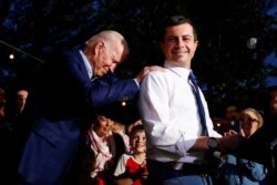 FILE - Former Democratic presidential candidate Pete Buttigieg endorses former U.S. Vice President Joe Biden at Chicken Scratch in Dallas, Texas, March 2, 2020.