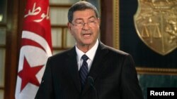 Tunisia's nominated prime minister Habib Essid speaks during his news conference, following a meeting with President Beji Caid Essebsi, Tunis, Jan. 23, 2015. 