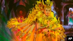 Performers rehearse ahead of the First World Conference on Tourism for Development in Beijing, China, May 17, 2016. (AP Photo/Ng Han Guan)