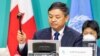The president of the U.N.-backed COP15 biodiversity conference, China's Minister of Ecology and Environment Huang Runqiu, lowers the gavel to pass the The Kunming-Montreal Global Biodiversity Framework in Montreal, Quebec, Canada, Dec. 19, 2022. 
