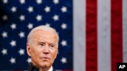 President Joe Biden addresses a joint session of Congress, in the House Chamber at the U.S. Capitol in Washington, April 28, 2021. 