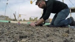 Artist Captures War as Seen by Children — Toys Included